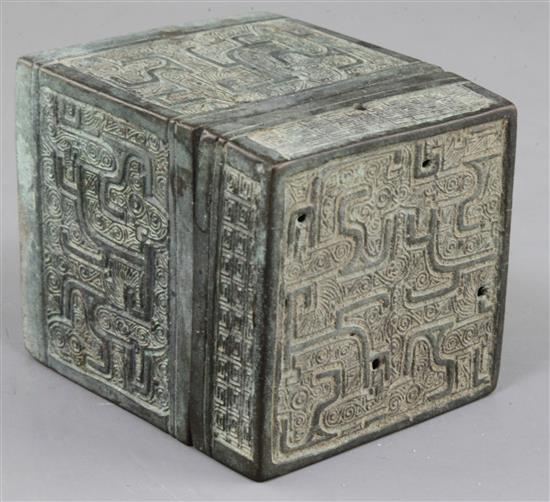 A Chinese archaic bronze square box and cover, Eastern Zhou dynasty, 6th-5th century B.C., 9.3cm high